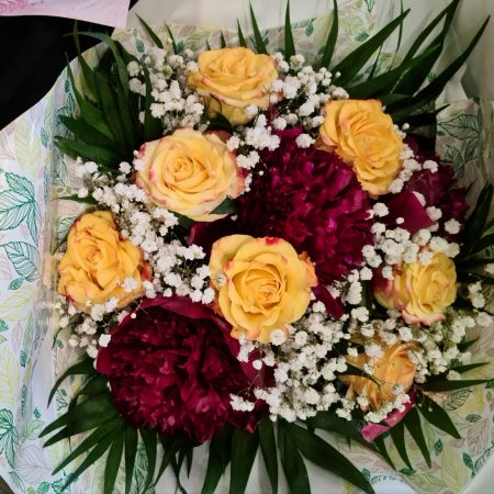 votre artisan fleuriste vous propose le bouquet : Bouquet rond orange et rose