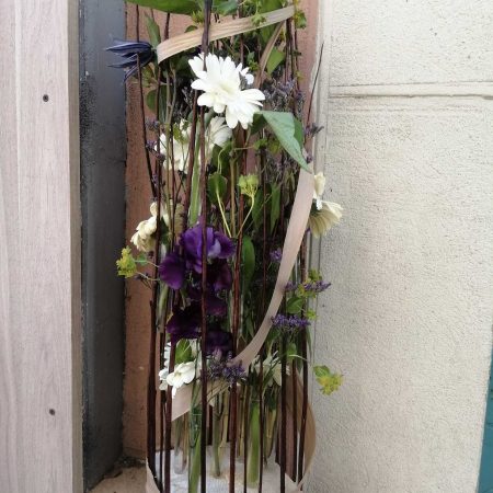 votre artisan fleuriste vous propose le bouquet : cage printanière