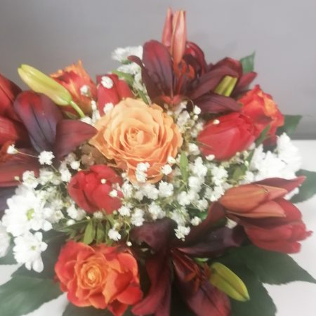 votre artisan fleuriste vous propose le bouquet : Bouquet rond orangé