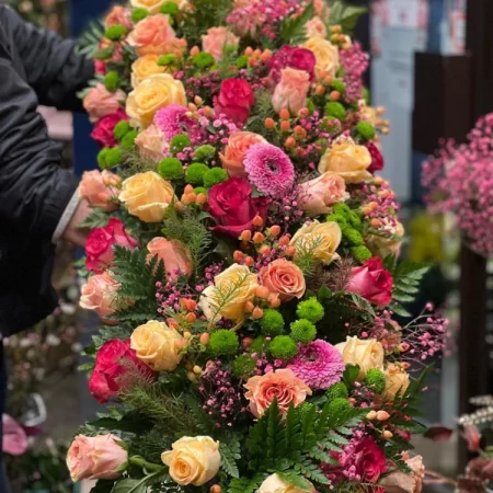 Raquette de deuil, par La Rose d'Ispahan, fleuriste à Paris