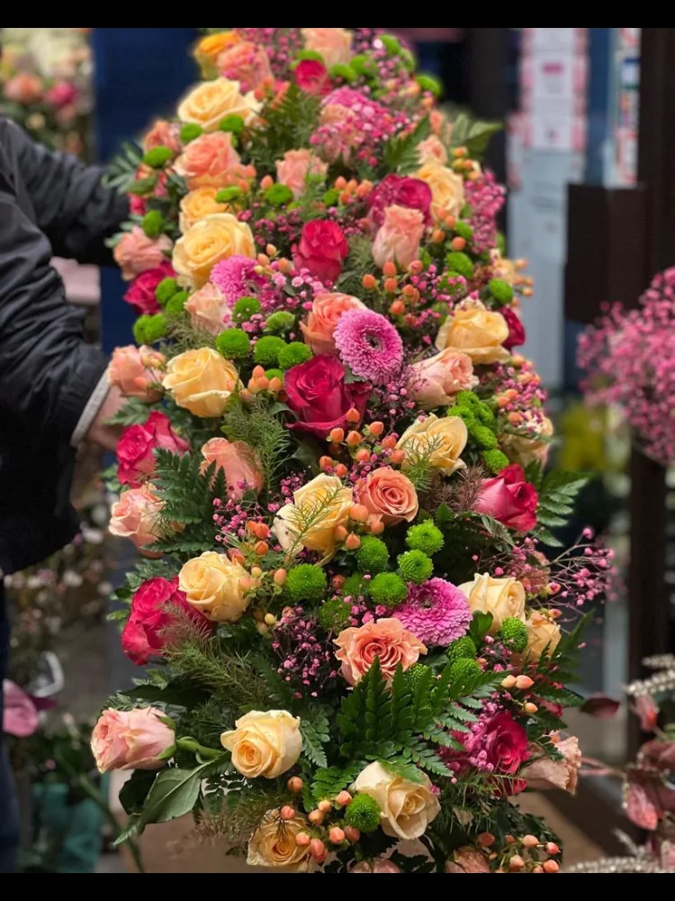 Raquette de deuil, par La Rose d'Ispahan, fleuriste à Paris