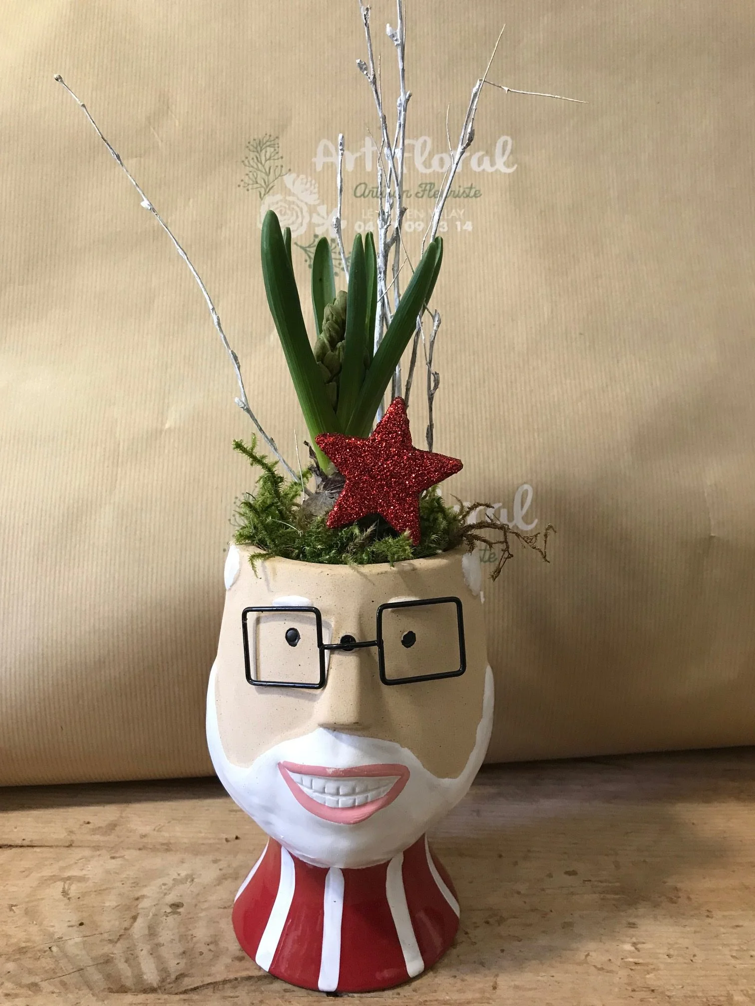 Tête Père Noel Jacinthe, par Art Floral Le Puy en Velay, fleuriste à Le Puy-en-Velay