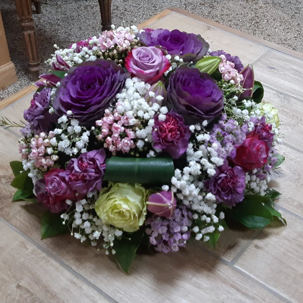 coussin rond, aux couleurs froides, par La Ros'oir, fleuriste à Nancy