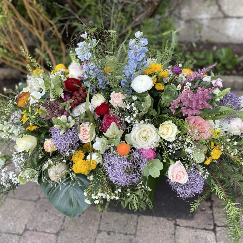 Raquette deuil, par Basille Fleurs, fleuriste à Sotteville-lès-Rouen