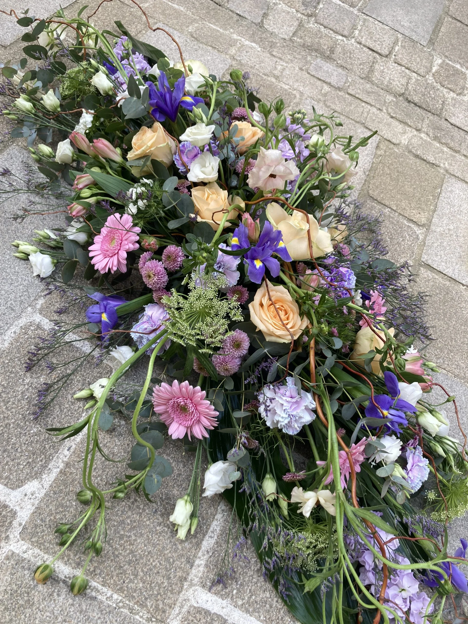 Le Raquette de Deuil, par Symbiose Artisans fleuriste, fleuriste à Rochechouart