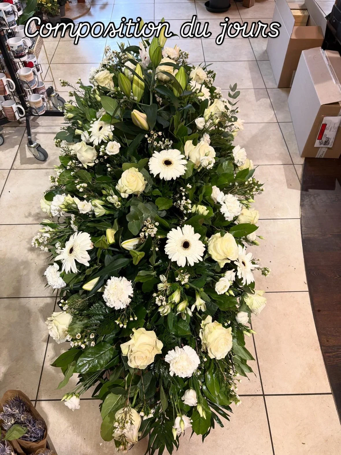 Raquette deuil, par Fleurs et Saveurs Cherbourg, fleuriste à Cherbourg-en-Cotentin