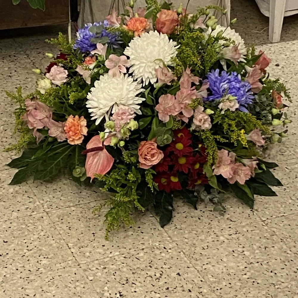 Coussin rond deuil, par Histoire de Fleurs Rougemont, fleuriste à Rougemont