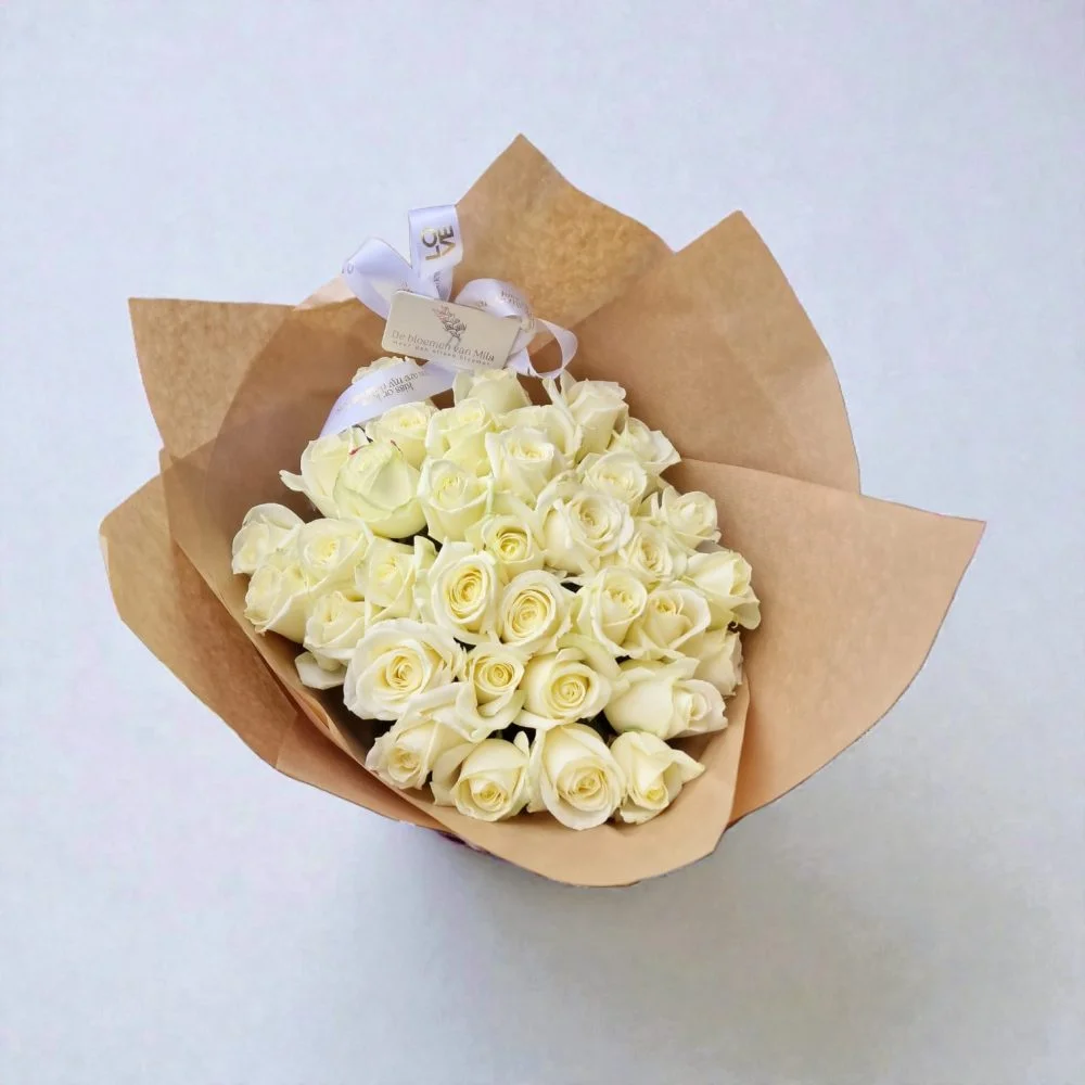 Bouquet de Roses blanches, par Les fleurs de Mila, fleuriste à Londerzeel