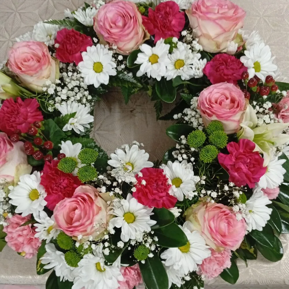 Couronne funéraire, par Fragrance tropicale, fleuriste à Capesterre-Belle-Eau