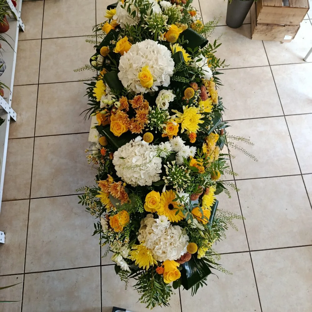 coussin ovale, par Frize Fleur, fleuriste à Lagny-sur-Marne